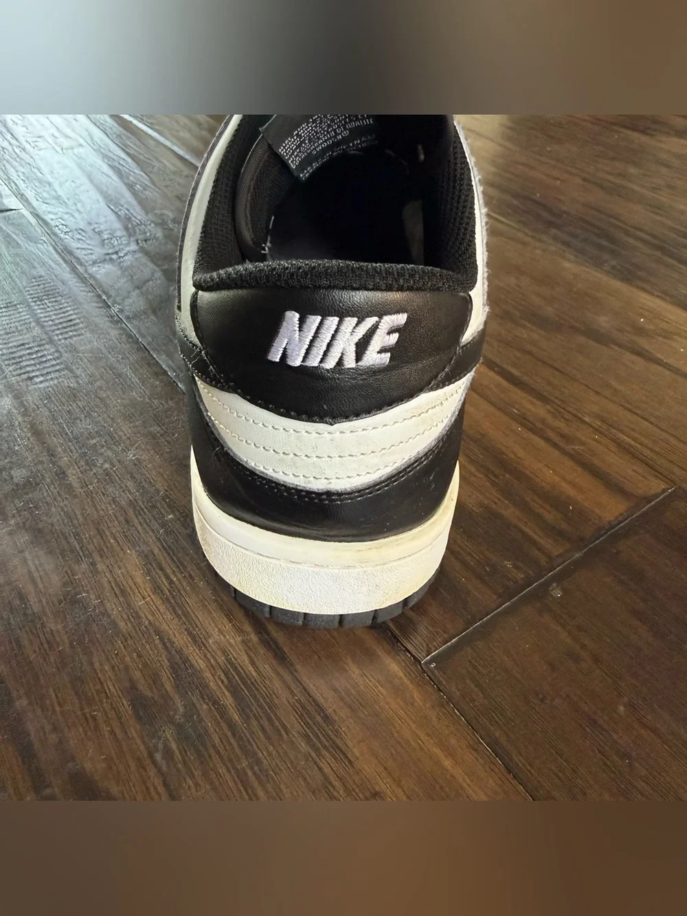 Nike men’s Black and White Low-Top Sneakers with Swoosh size 11